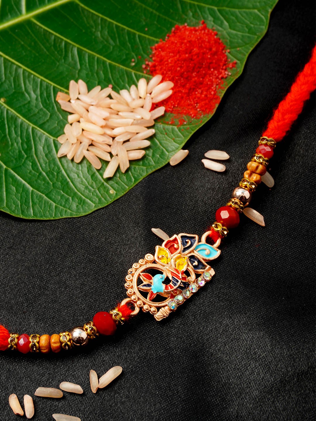 

Urmika Men Red & Brown Beaded Rakhi