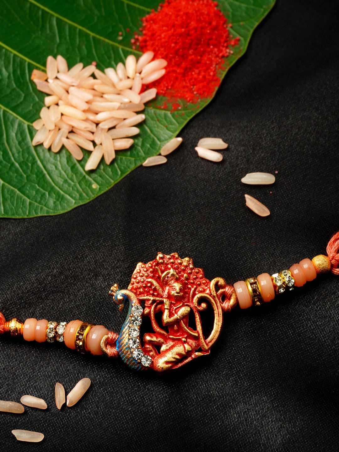 

Urmika Men Red Thread Rakhi With Roli Chawal