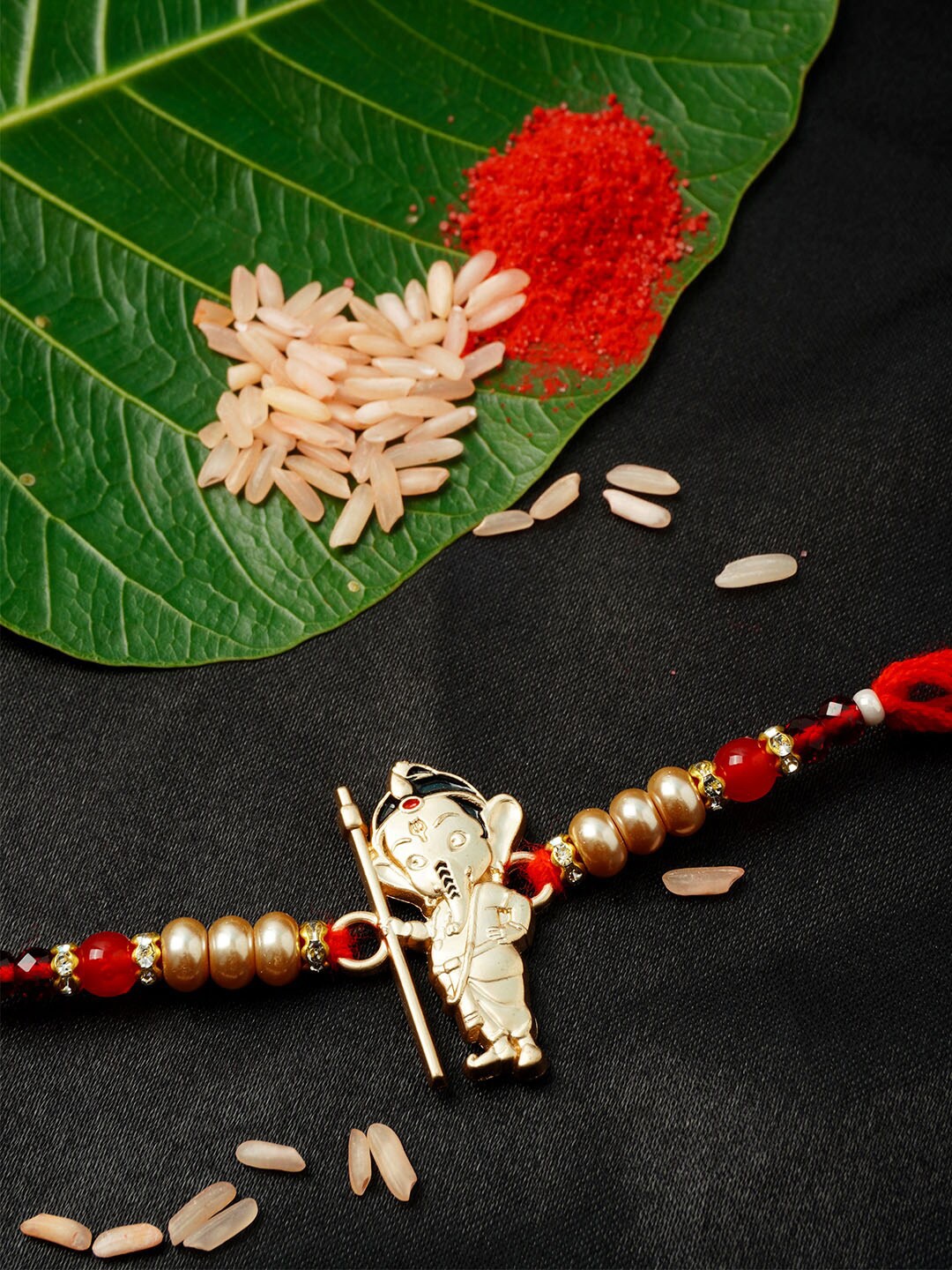 

Urmika Men Red & Gold-Coloured Beaded Rakhi