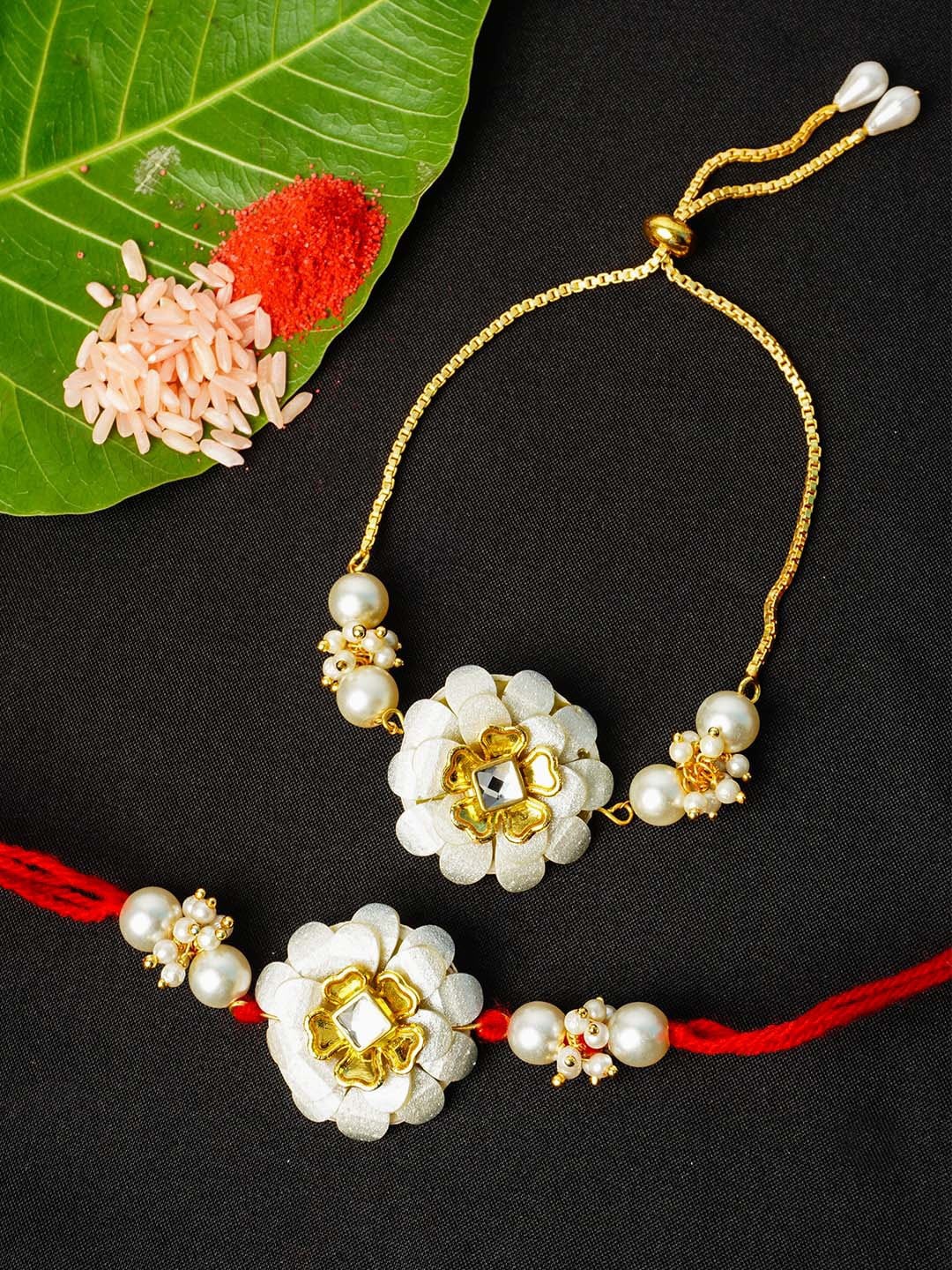 

Urmika Set of 2 Crystal Center Rose Bhai Bhabhi Rakhi With Roli Chawal, White