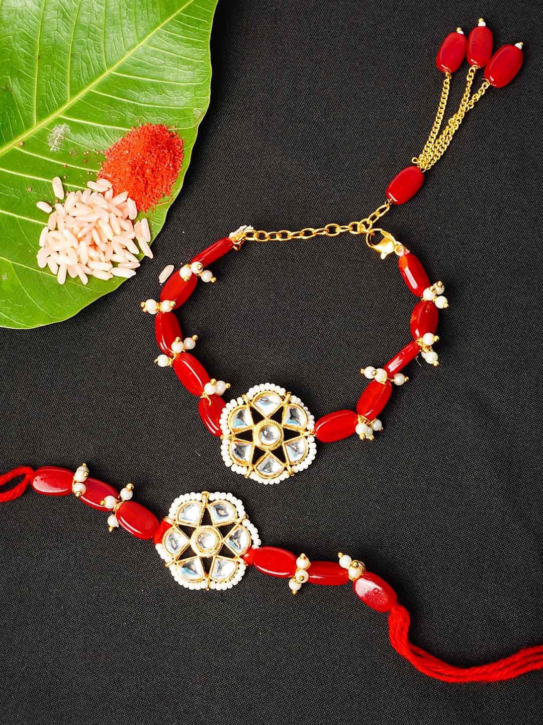 

Urmika Men Red & Gold-Toned Stone Studded Floral Rakhi