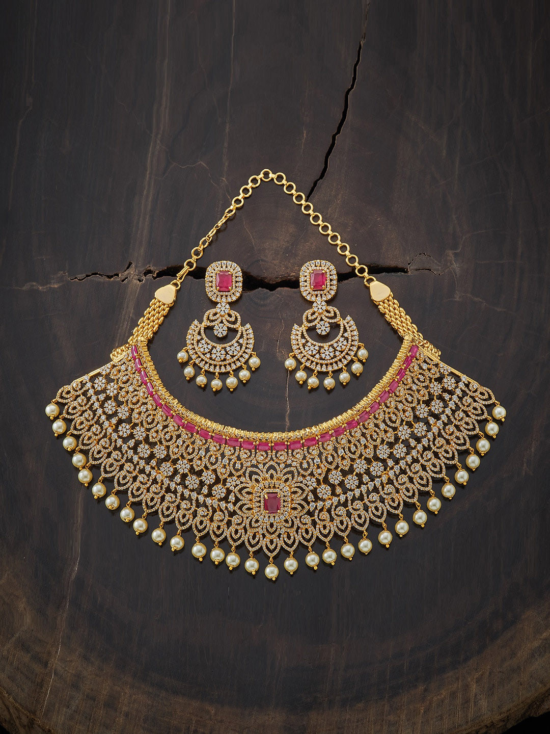 

Kushal's Fashion Jewellery Gold-Plated White & Red Stone Studded Jewellery Set