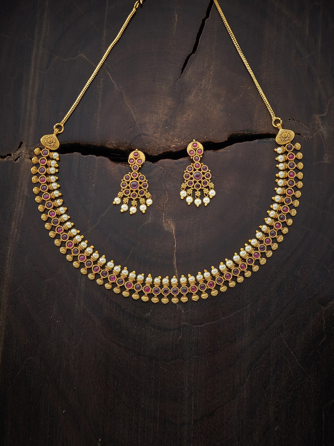 

Kushal's Fashion Jewellery Gold-Plated Red Stone Studded Ethnic Jewellery Set