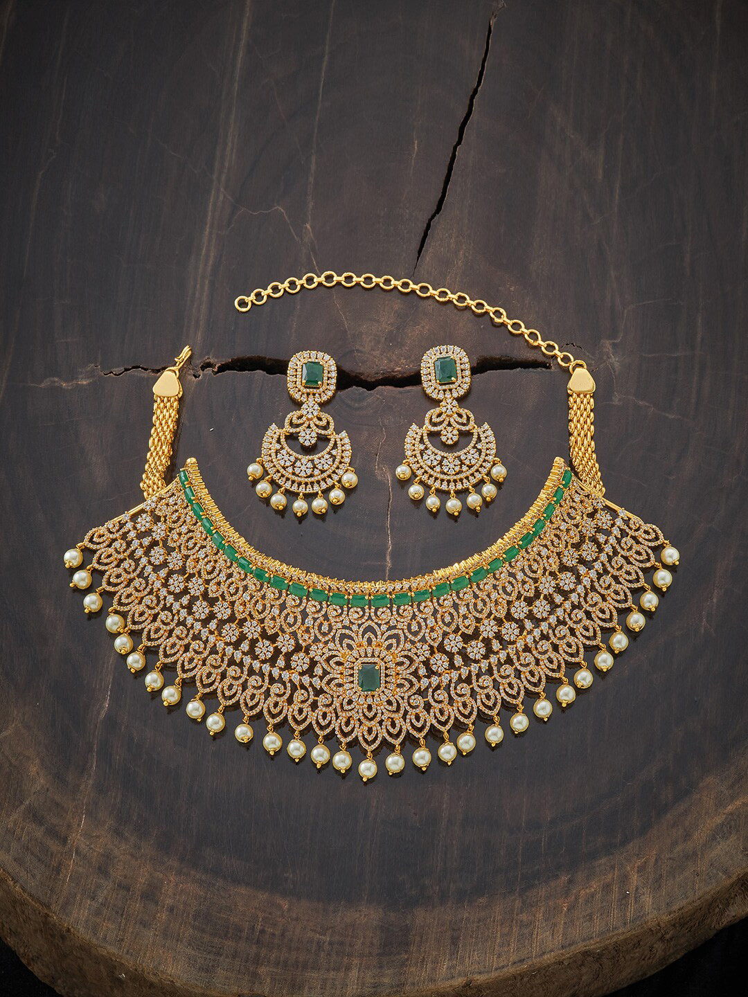 

Kushal's Fashion Jewellery Gold-Plated White & Green Stone-Studded & Pearl Beaded Jewellery Set