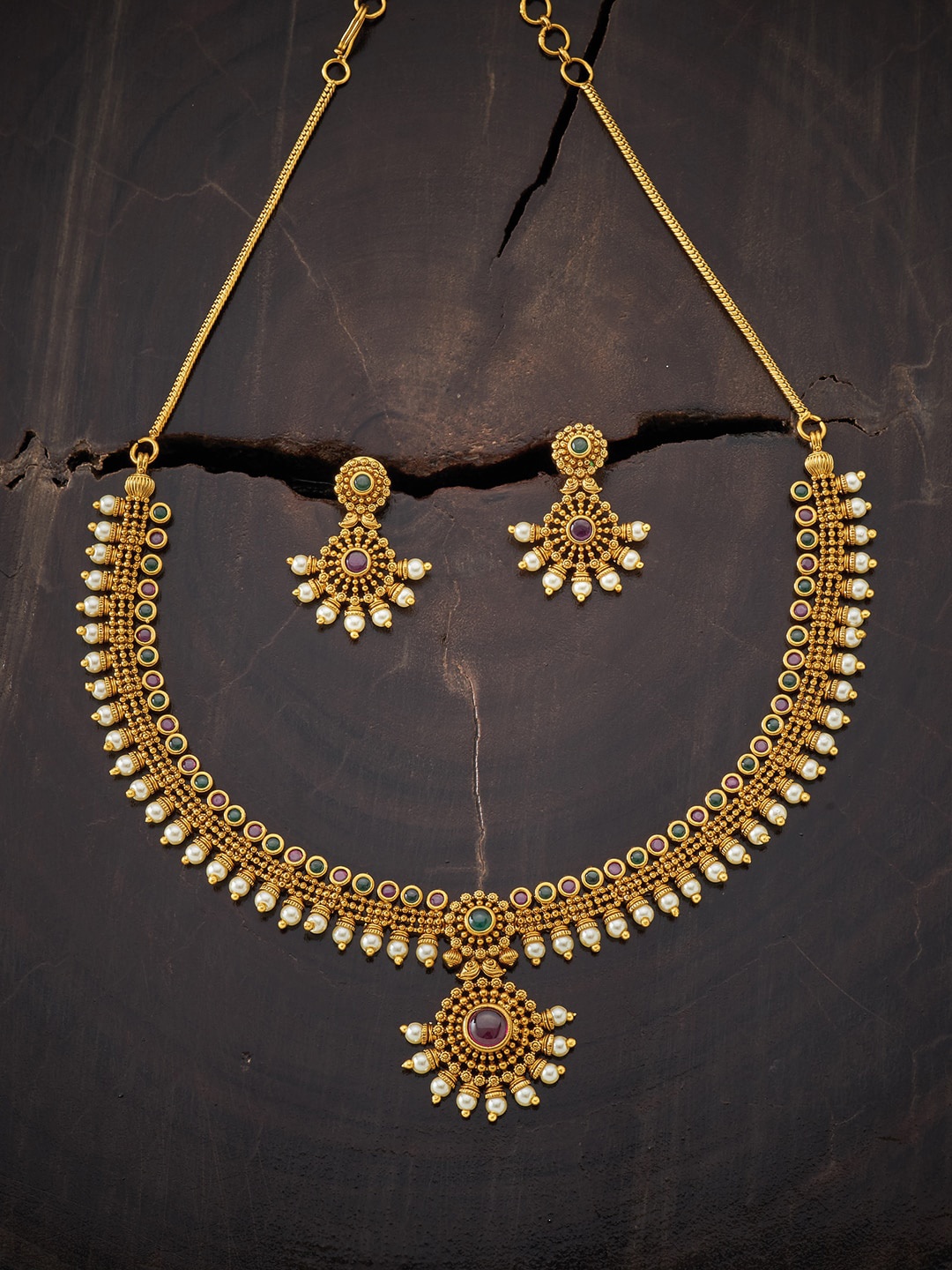 

Kushal's Fashion Jewellery Gold-Plated Red Stone Studded Antique Jewellery Set