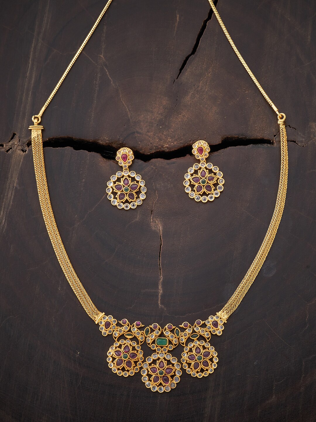 

Kushal's Fashion Jewellery Gold-Plated Red Stone Studded Antique Jewellery Set