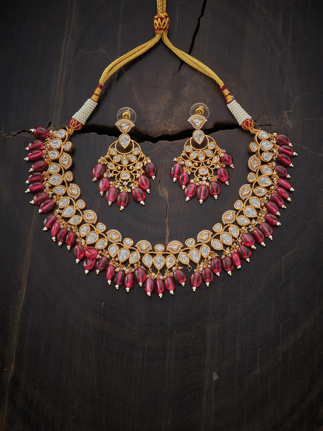 

Kushal's Fashion Jewellery Gold-Plated Red & White Kundan-Studded & Beaded Jewellery Set