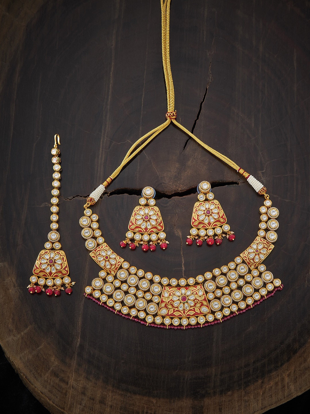 

Kushal's Fashion Jewellery Gold-Plated White & Red Kundan Studded Jewellery Set