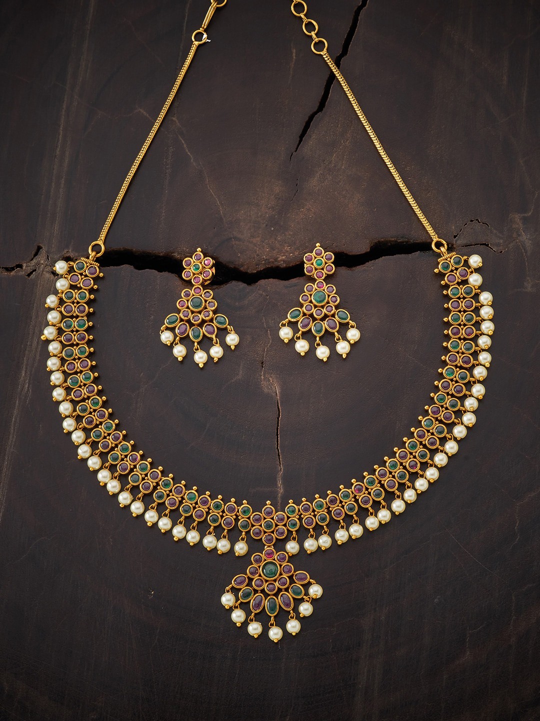 

Kushal's Fashion Jewellery Gold-Plated Red CZ Studded Antique Jewellery Set