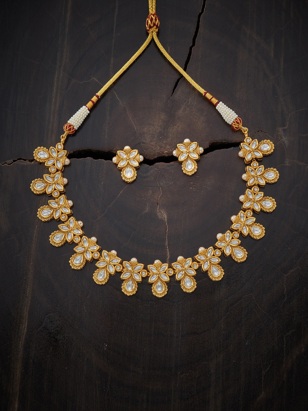

Kushal's Fashion Jewellery Gold-Plated & White Kundan-Studded Jewellery Set