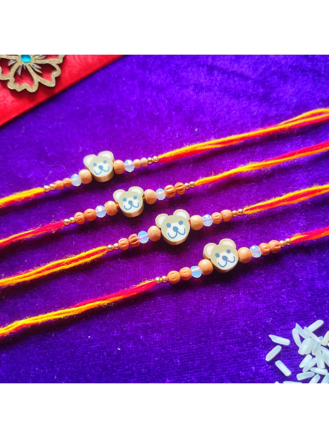 

CRAYTON Men Set Of 4 Maroon & Yellow Beaded Rakhi, Red