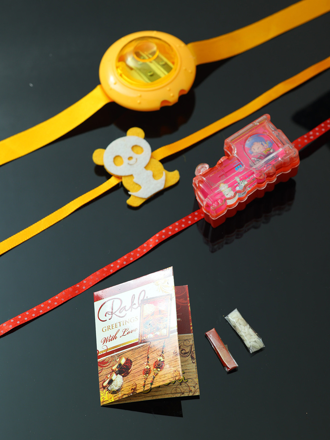

PASSION PETALS Red Rakhi Set