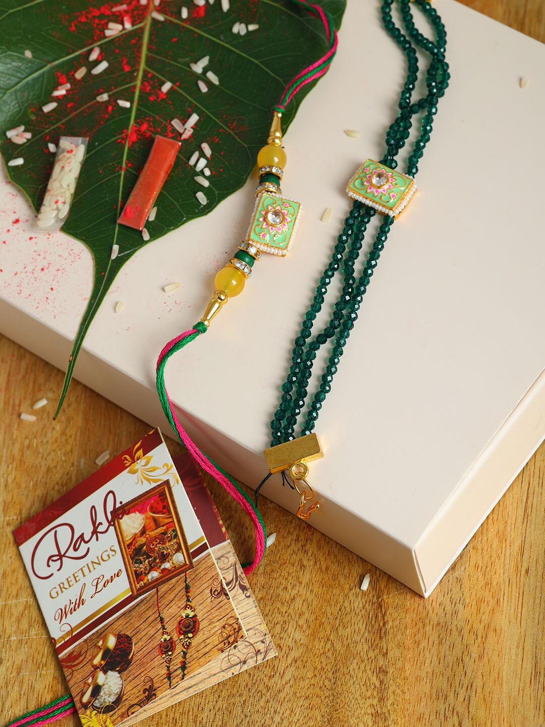 

PASSION PETALS Green Pearls Bhaiya Bhabhi Rakhi Set