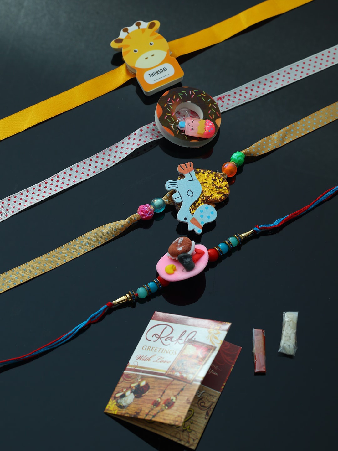 

PASSION PETALS Pack of 6 Multicoloured Rakhi with Roli Chawal Set, Multi
