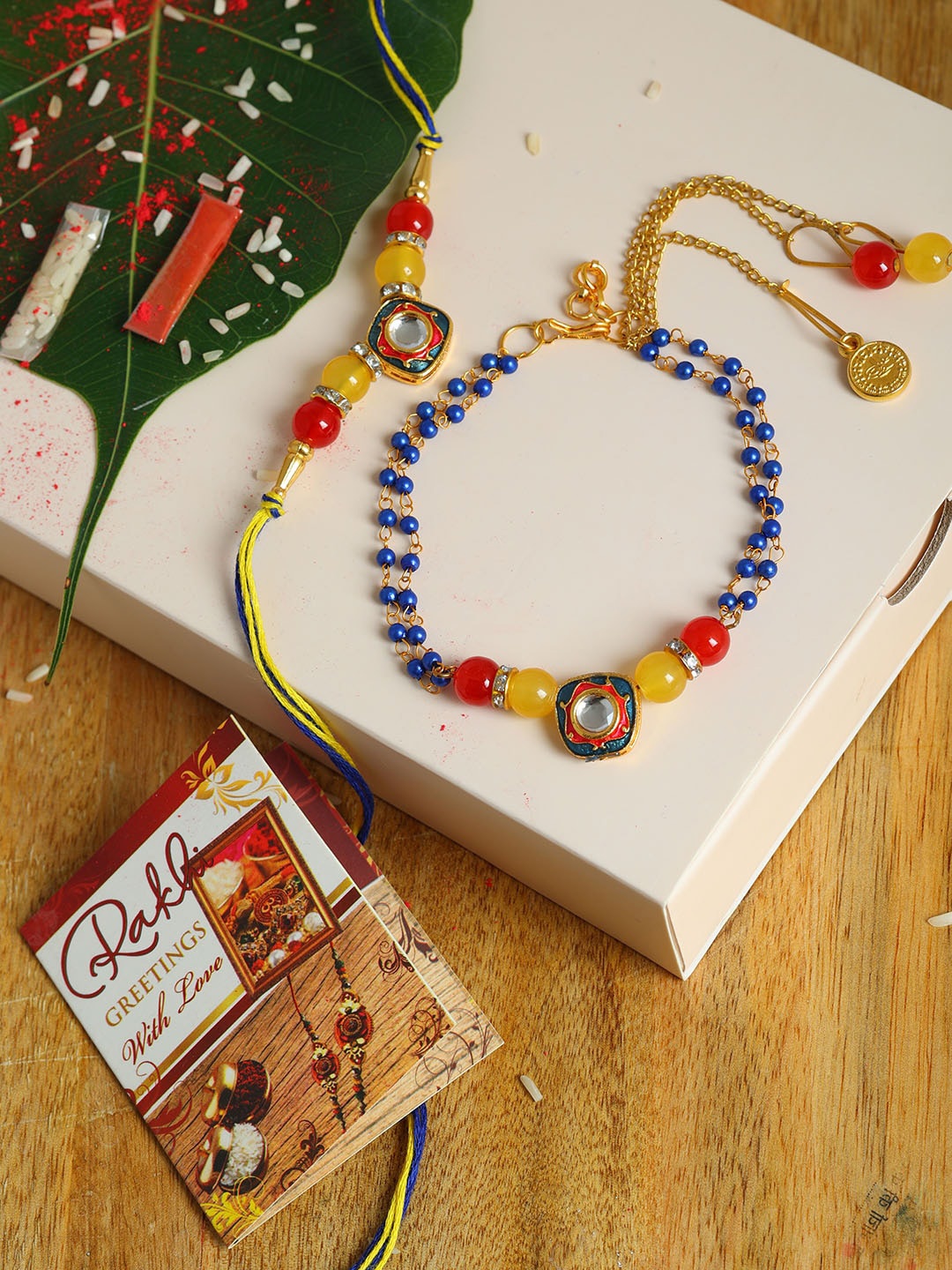 

PASSION PETALS Set Of 2 Bracelet Style Blue Stone Studded Rakhi, Multi