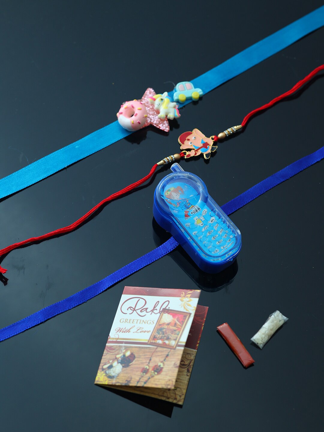 

PASSION PETALS Pack of 5 Multicoloured Rakhi with Roli Chawal Set, Multi