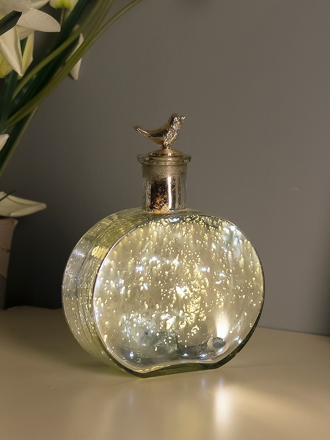 

Homesake Silver Copper Star String Light With Round Bottle Showpiece