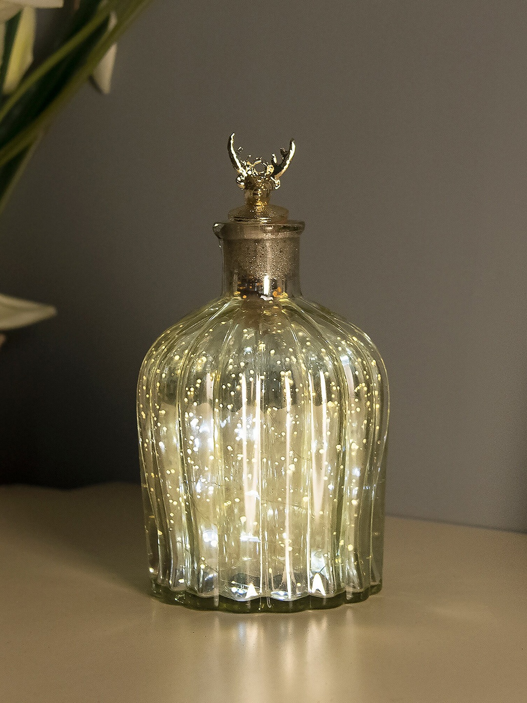 

Homesake Silver-Toned Flat Base Bottle Copper Star String Lights With Deer Lid