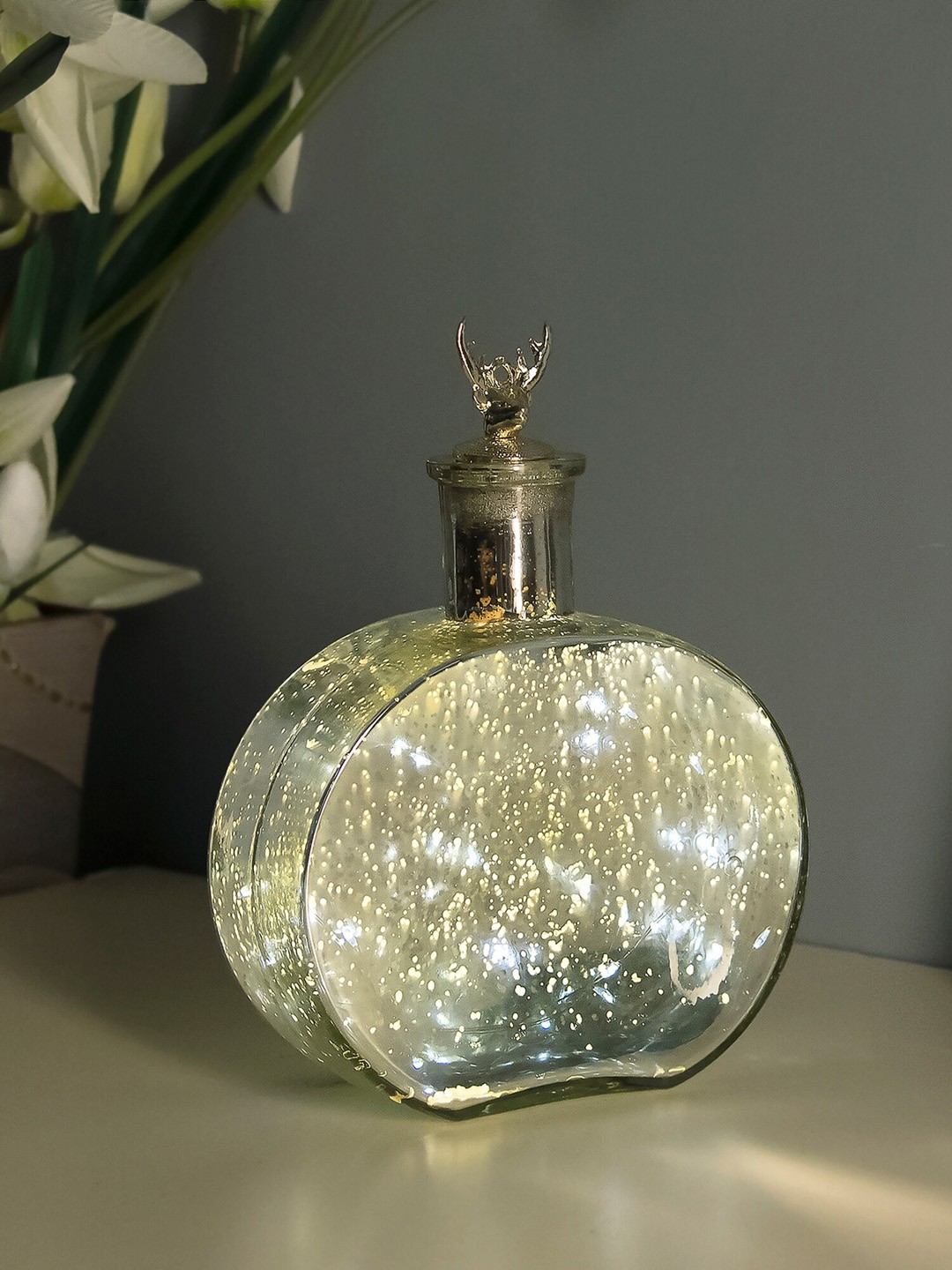 

Homesake Silver Copper Star String Light With Round Bottle Showpiece