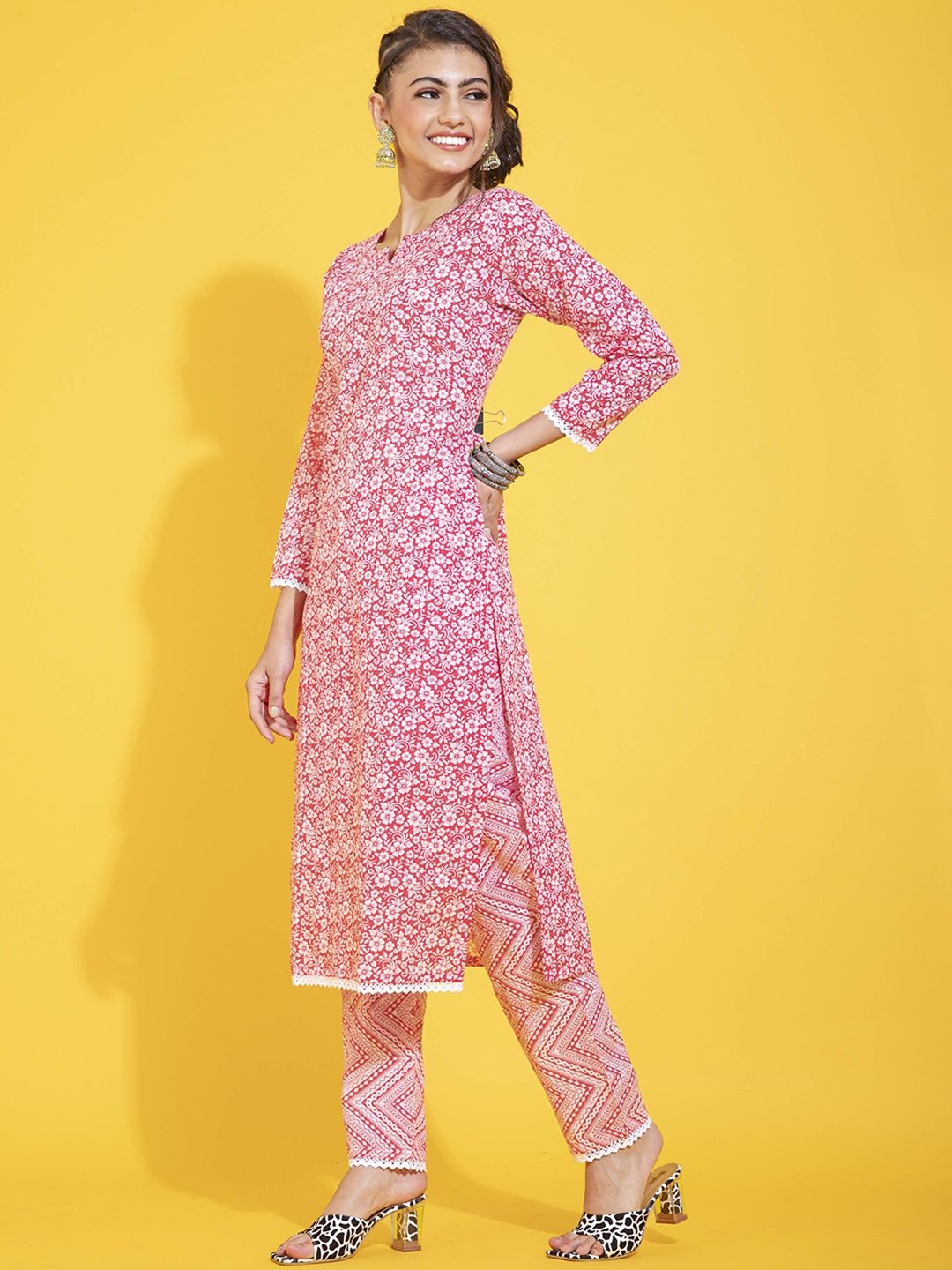 

POONAM DESIGNER Women Pink Floral Embroidered Pure Cotton Kurti with Trousers