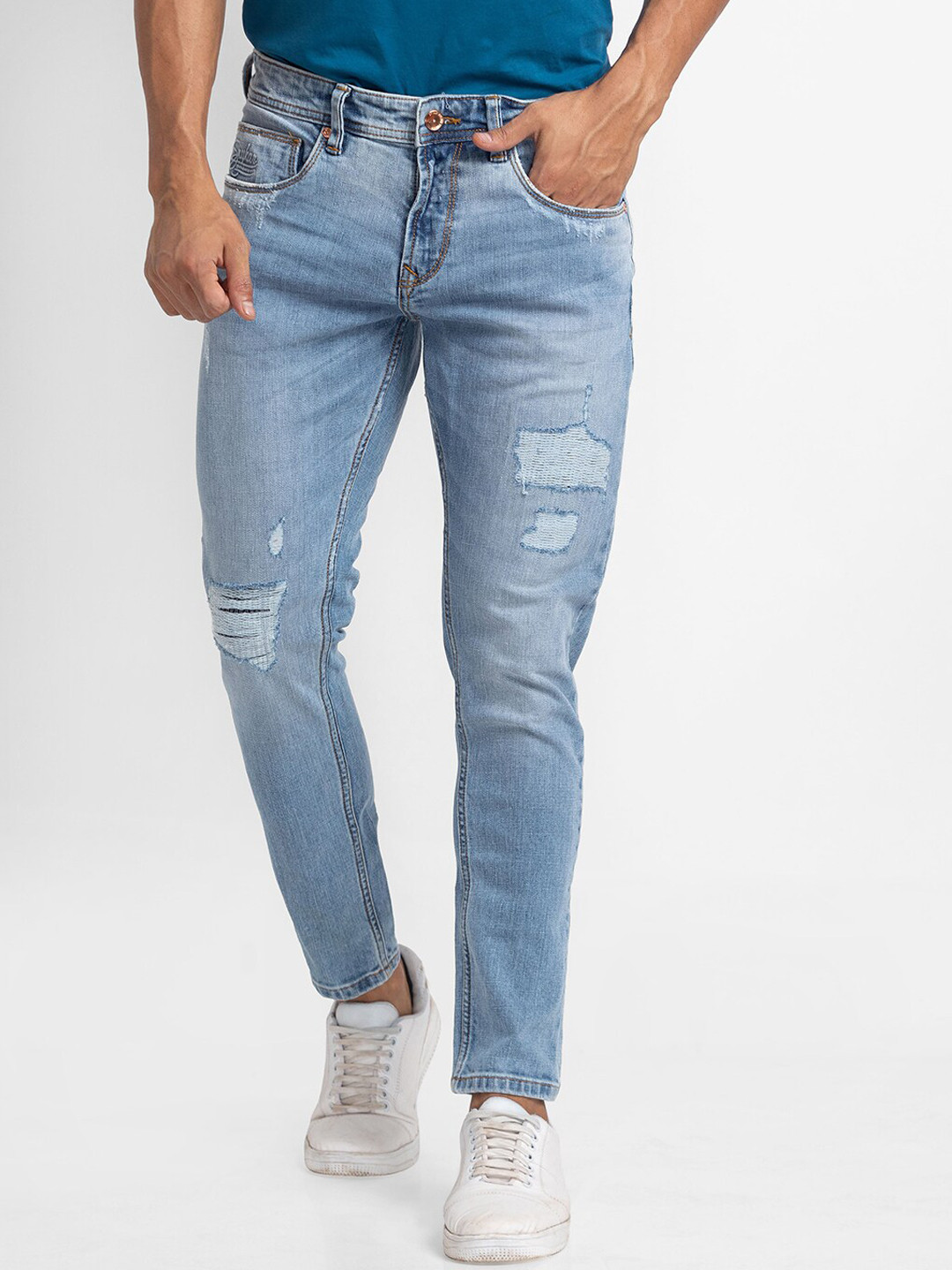 

SPYKAR Men Blue Tapered Fit Mildly Distressed Heavy Fade Jeans