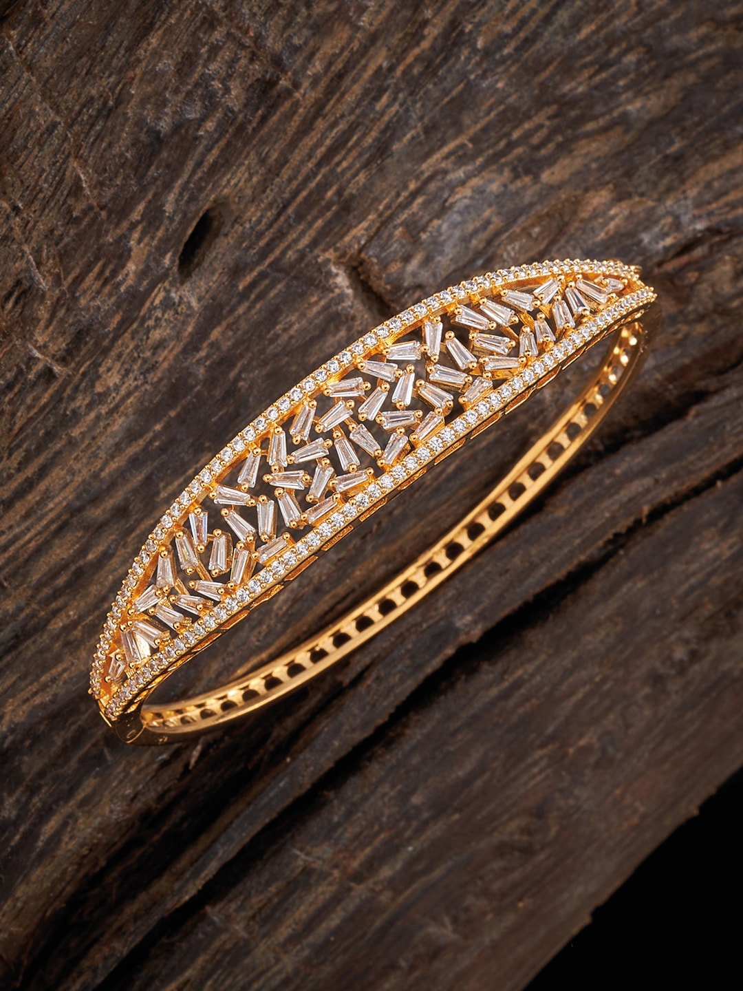 

Kushal's Fashion Jewellery Women Gold-Toned & White Cubic Zirconia Kada Bracelet