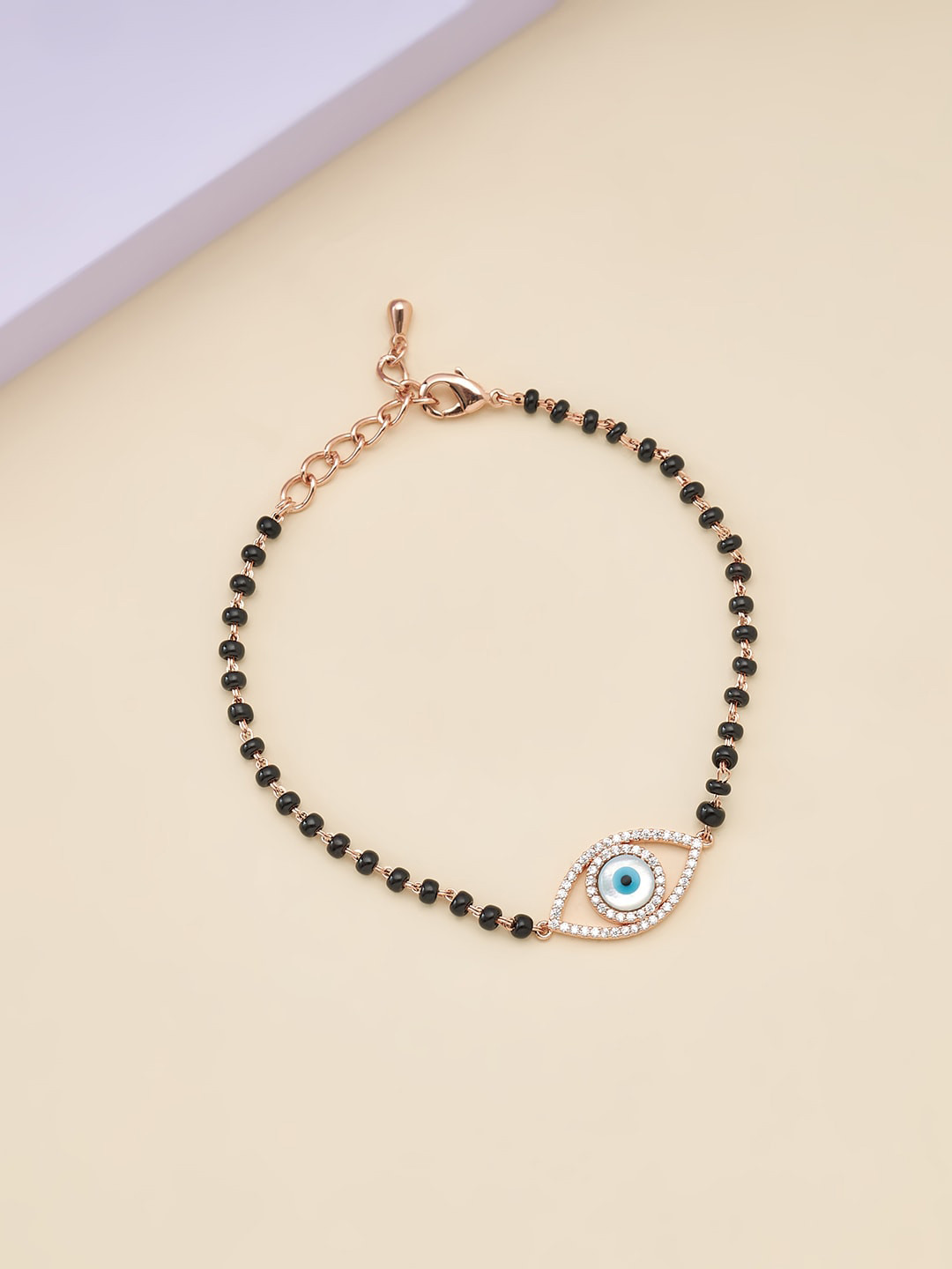 

Kushal's Fashion Jewellery Women Gold-Toned & Black Cubic Zirconia Rose Gold-Plated Link Bracelet