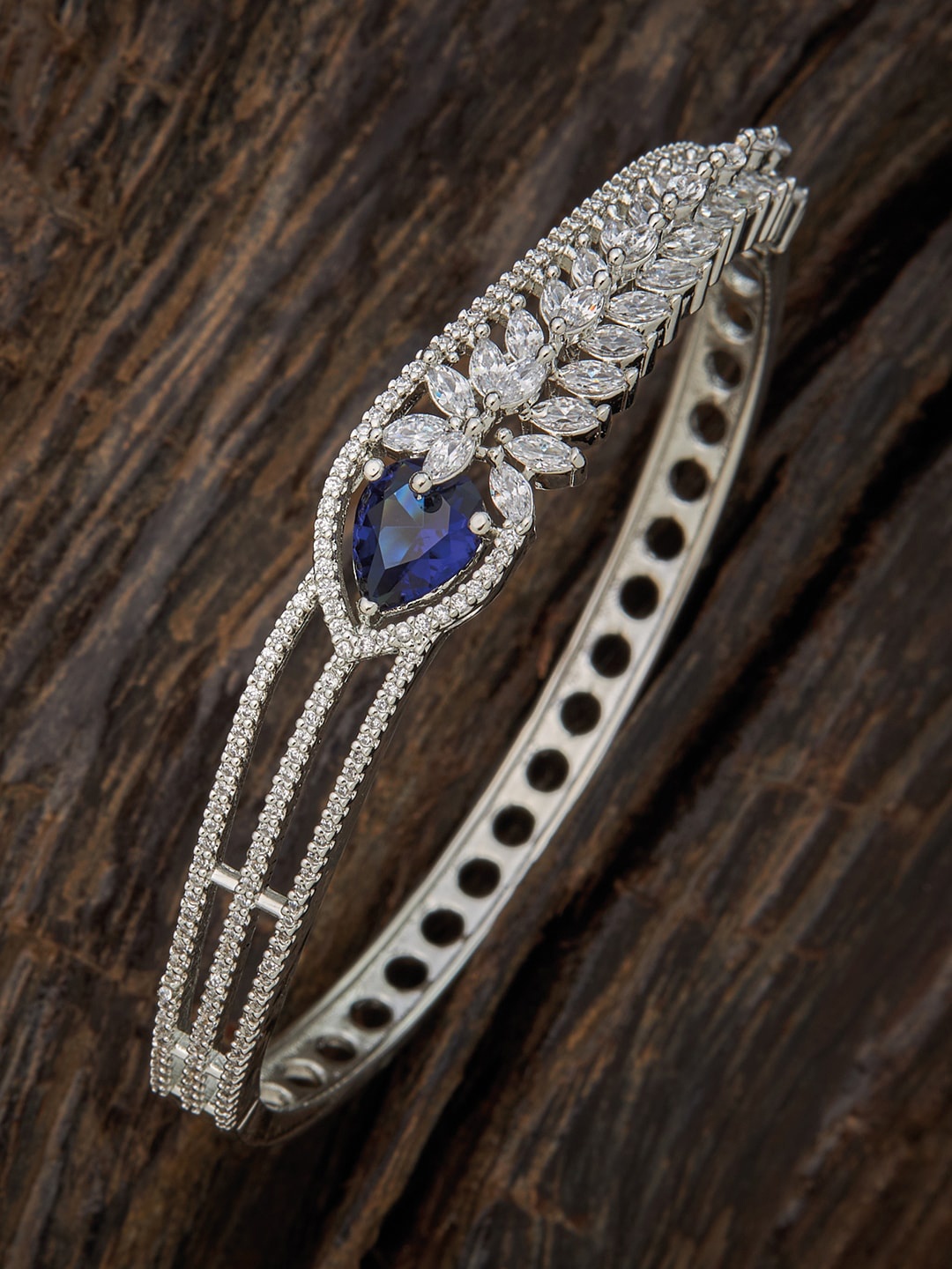

Kushal's Fashion Jewellery Women Silver-Toned & Blue Cubic Zirconia Rhodium-Plated Kada Bracelet