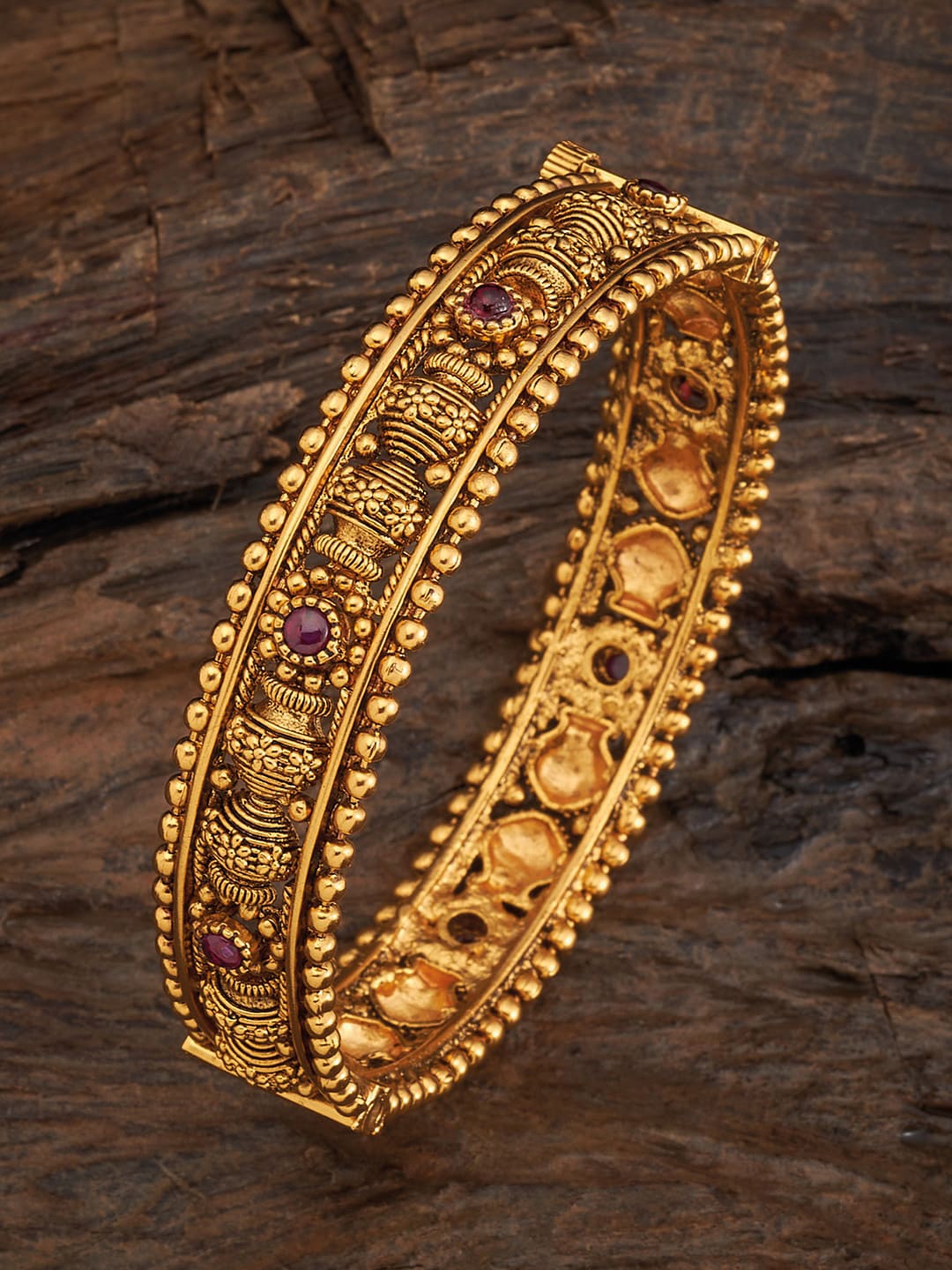 

Kushal's Fashion Jewellery Gold-Plated Red Stone-Studded Antique Bangle