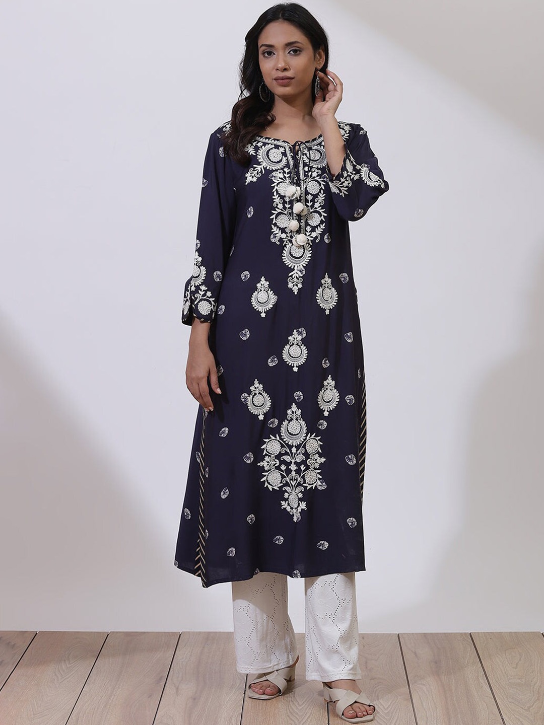 

Lakshita Women Blue Floral Embellished Flared Sleeves Kurta