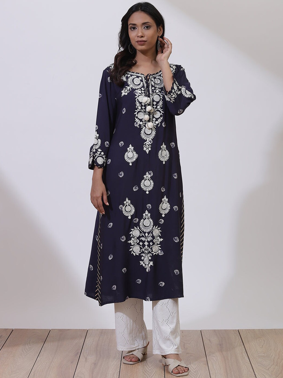 

Lakshita Women Blue Floral Embellished Flared Sleeves Kurta