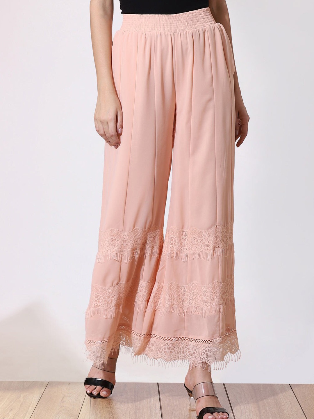 

Lakshita Women Peach-Coloured Embroidered Flared Palazzos