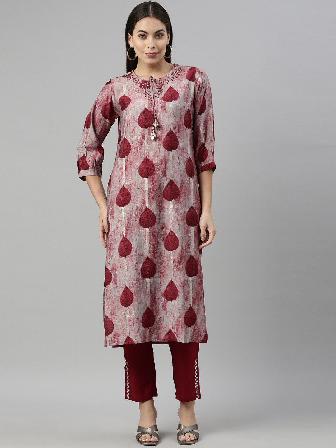 

Neerus Women Maroon Ethnic Motifs Printed Panelled Thread Work Kurti with Trousers