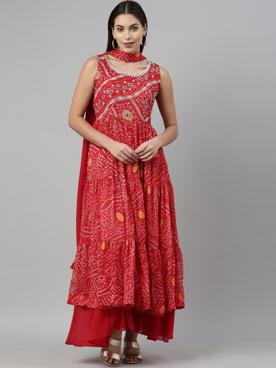 

Neerus Women Red Ethnic Motifs Embroidered High Slit Zardozi Kurti with Sharara