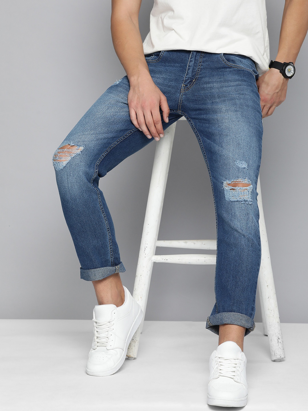 

Mast & Harbour Men Blue Slim Fit Mildly Distressed Light Fade Stretchable Jeans