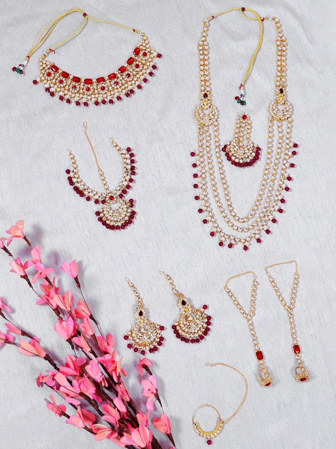 

Crunchy Fashion Gold-Plated Red Stones-Studded & Beaded Bridal Jewellery Set