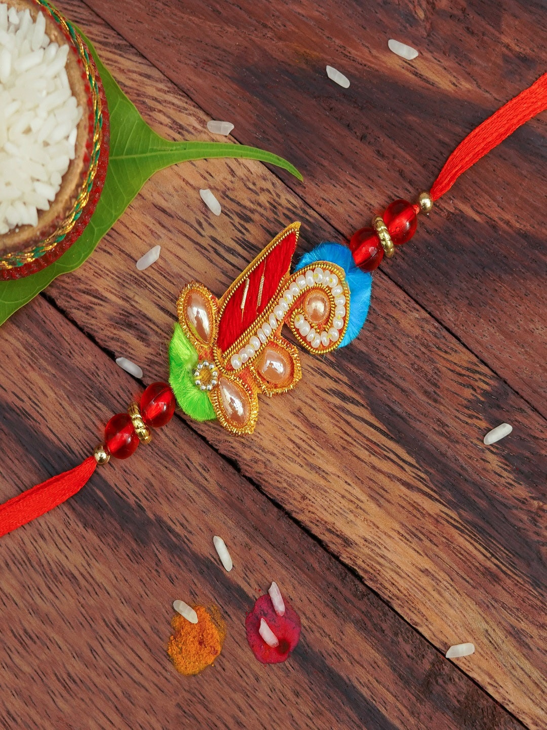 

The Magic Wand Boys Red & Blue Pearl Beaded Rakhi