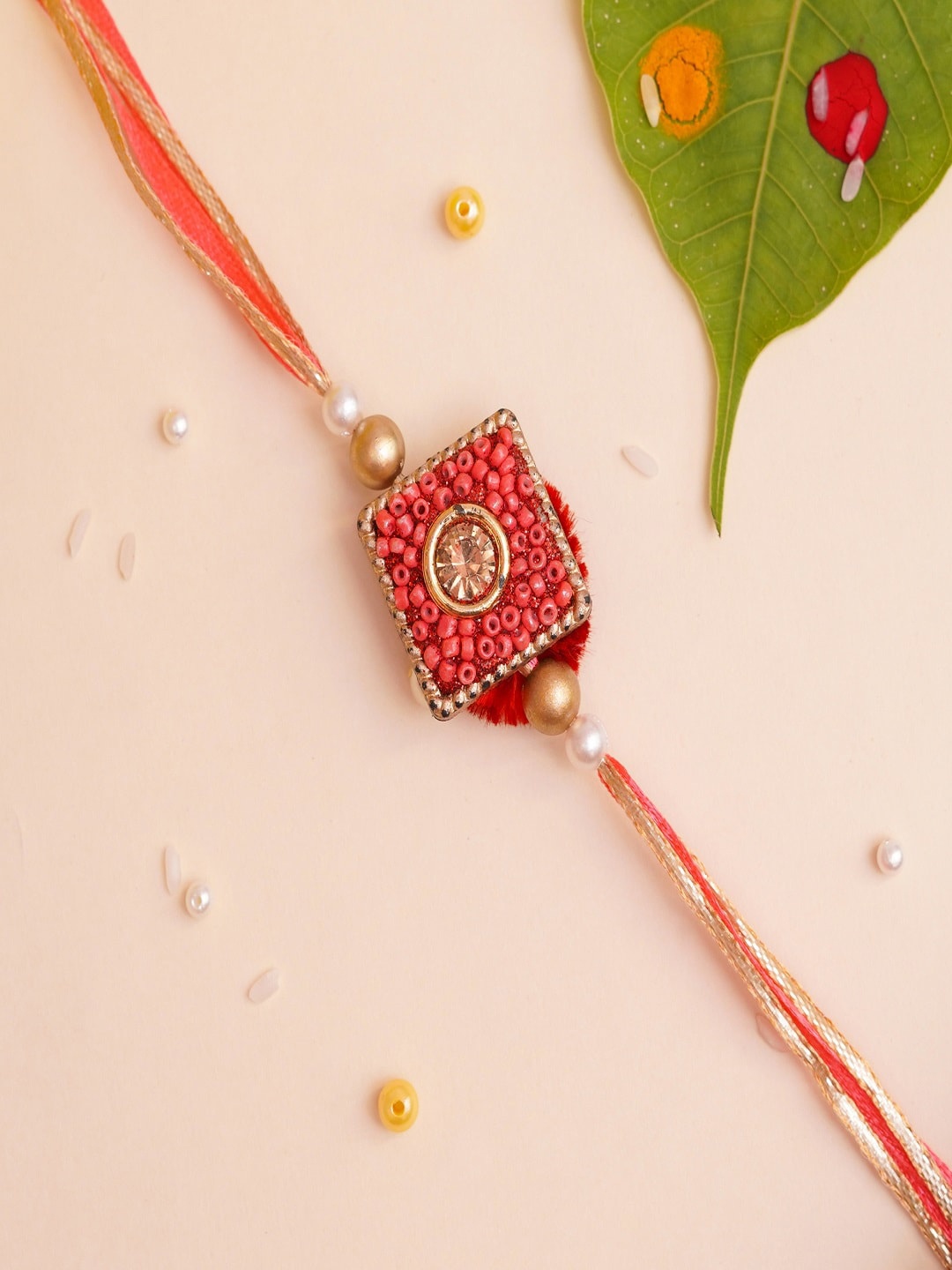 

The Magic Wand Boys Red & Off-White Pearl Beaded Rakhi