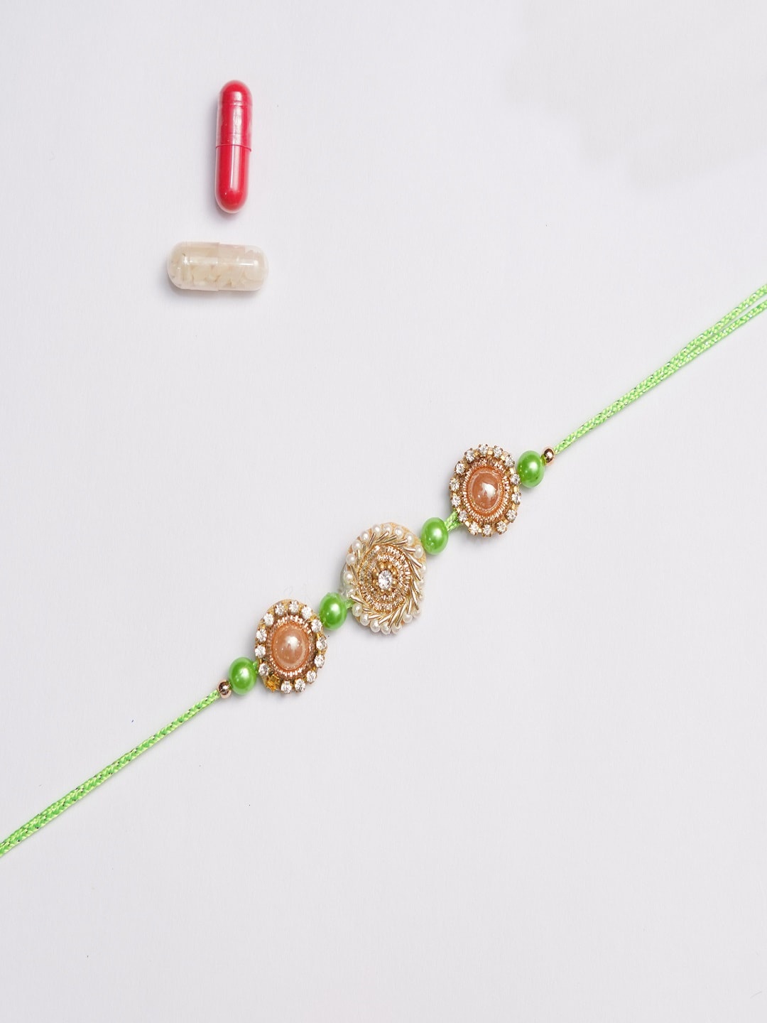 

The Magic Wand Boys Green Pearl Beaded Rakhi With Roli & Chawal, Multi