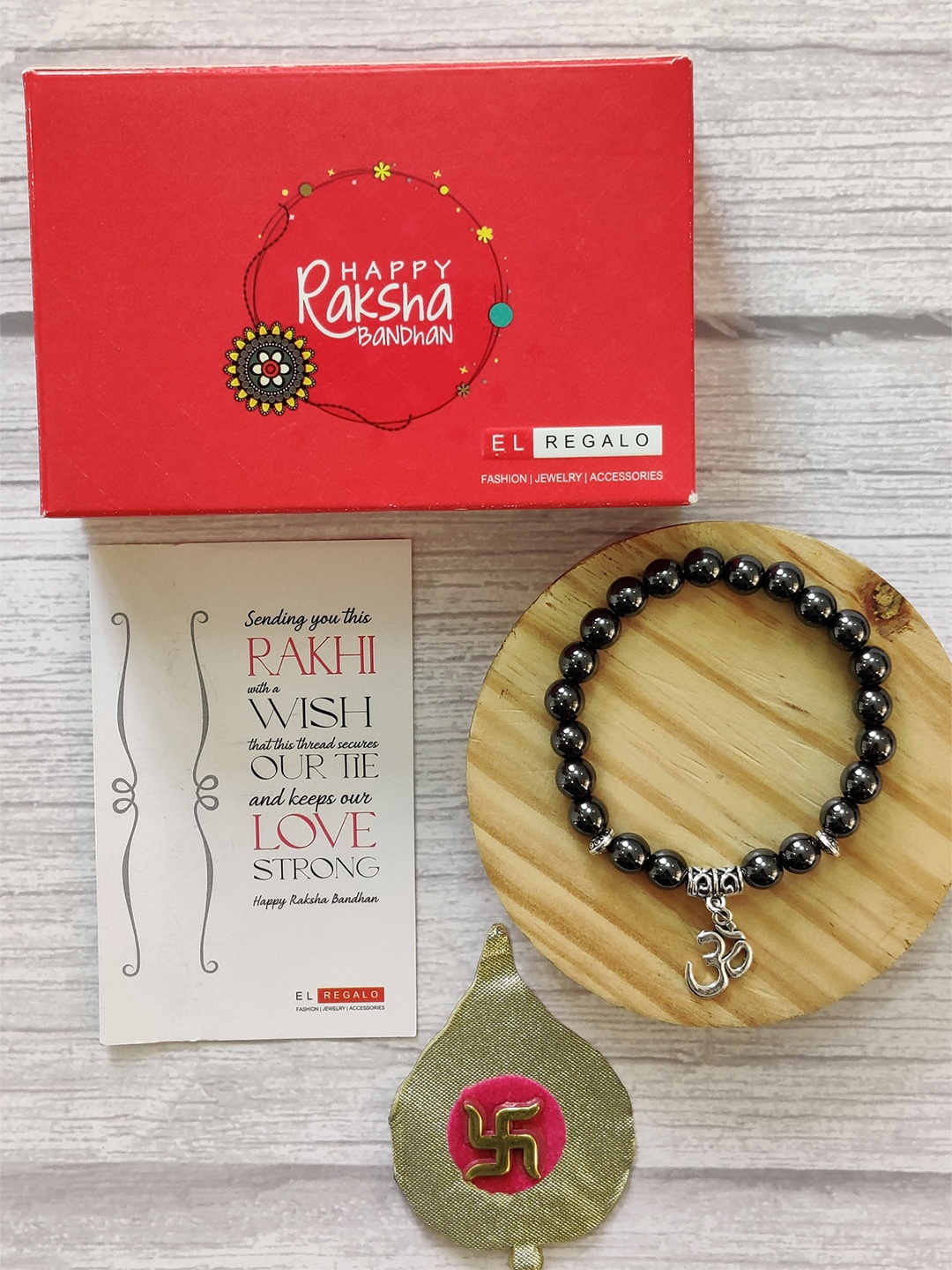 

EL REGALO Black & Silver-toned OM Charm Bracelet Rakhi