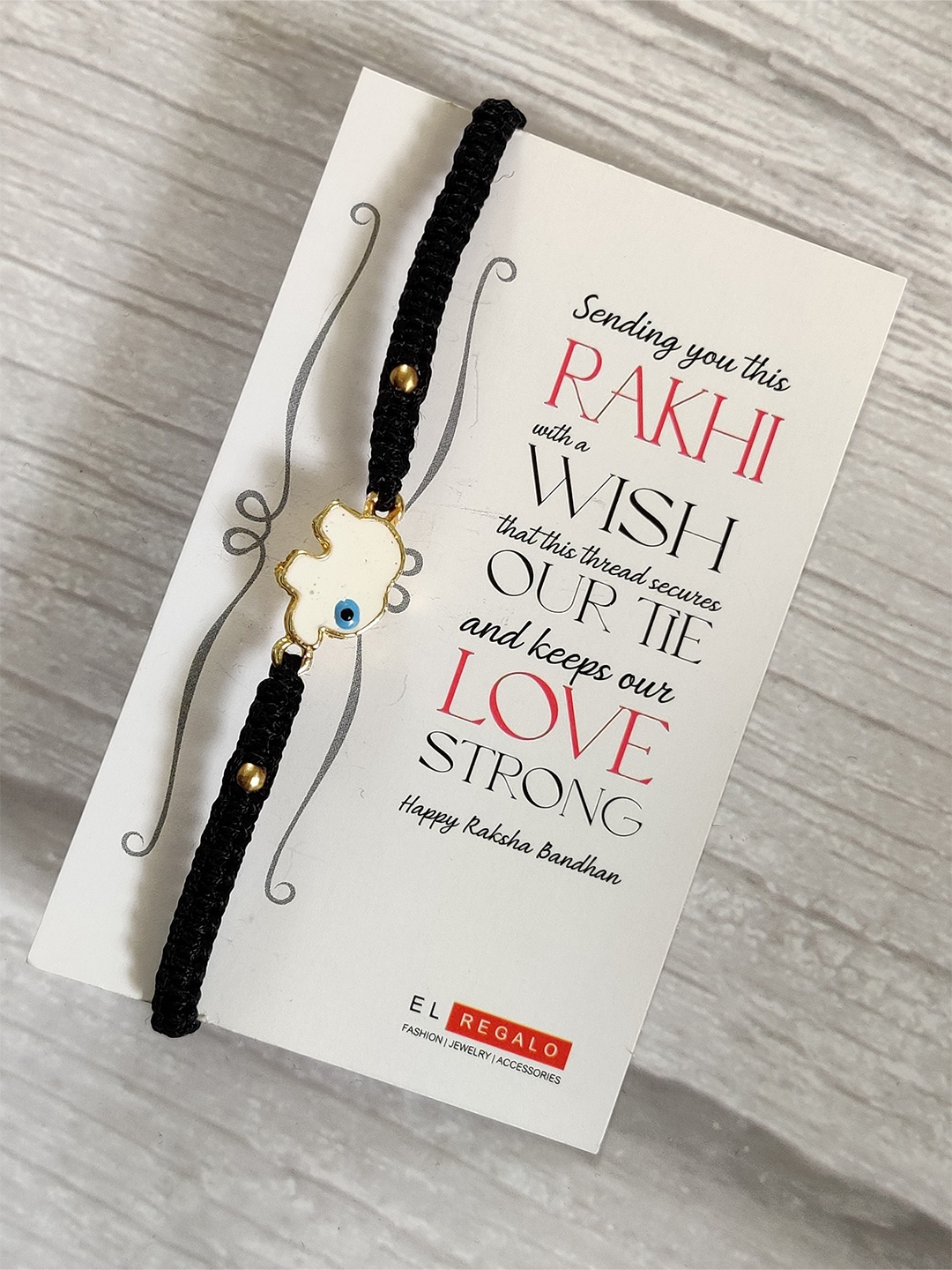 

EL REGALO White & Black Rakhi & Greeting Card Set