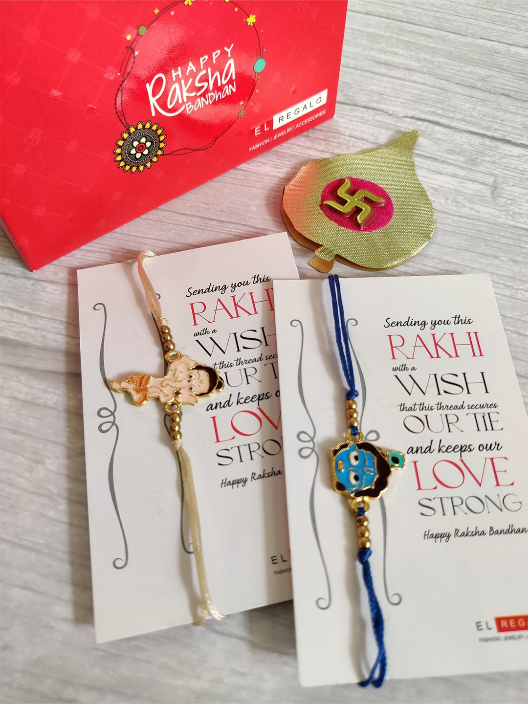 

EL REGALO Kids Blue 2 Rakhi Greeting Card Combo with Card & Roli Chawal Shagun