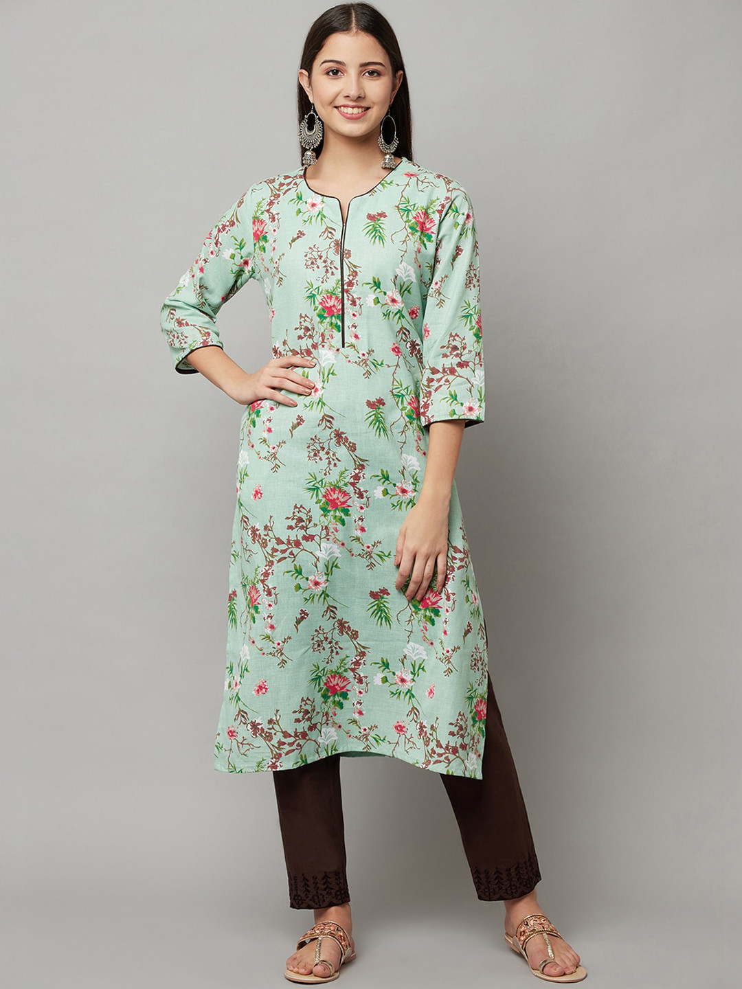 

FLAVIDO Women Green Floral Printed Panelled Linen Kurti with Trousers