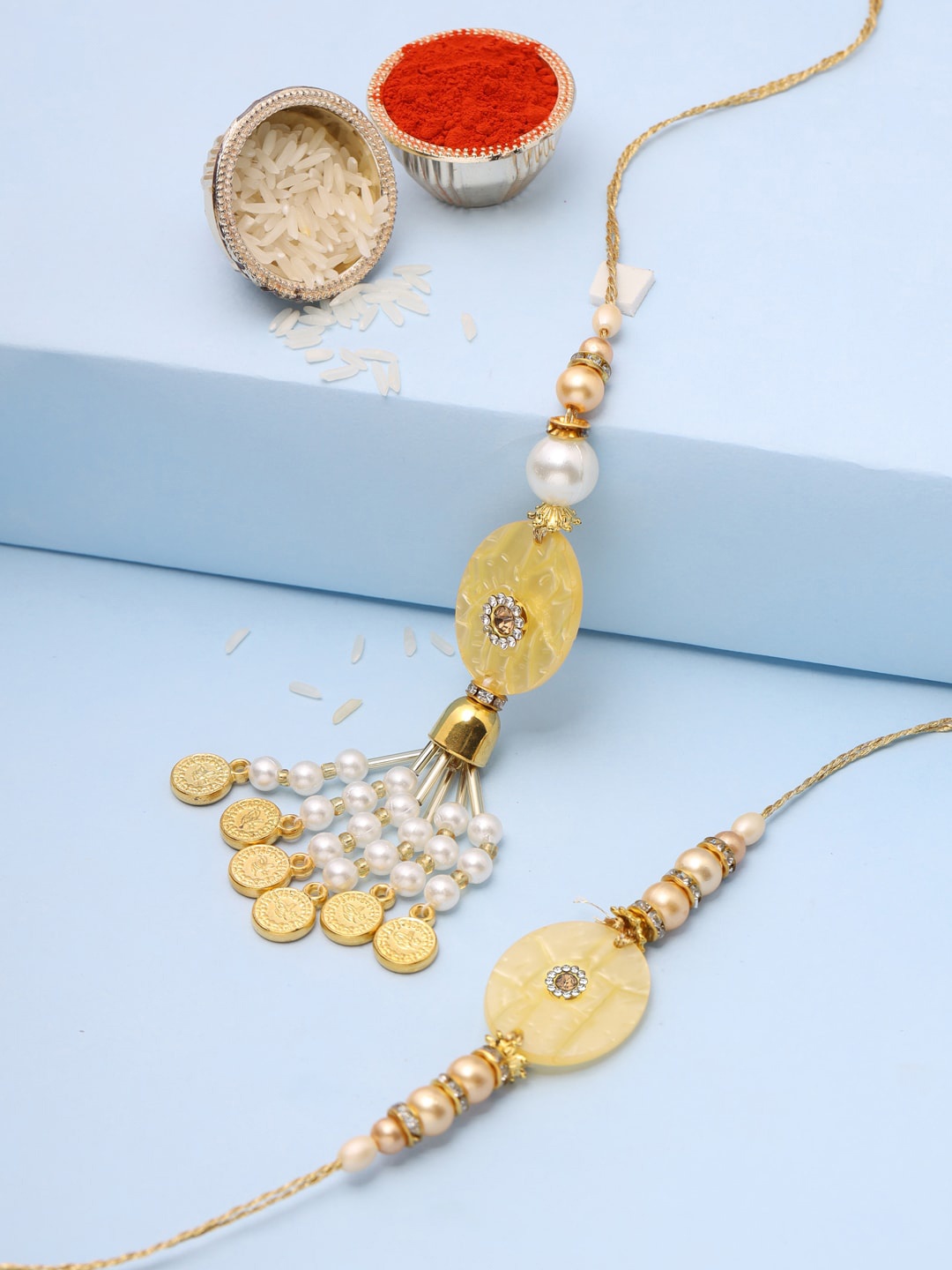 

VIRAASI Set of 2 Yellow & Gold-Toned Pearl Beaded Bhaiya Bhabhi Rakhi