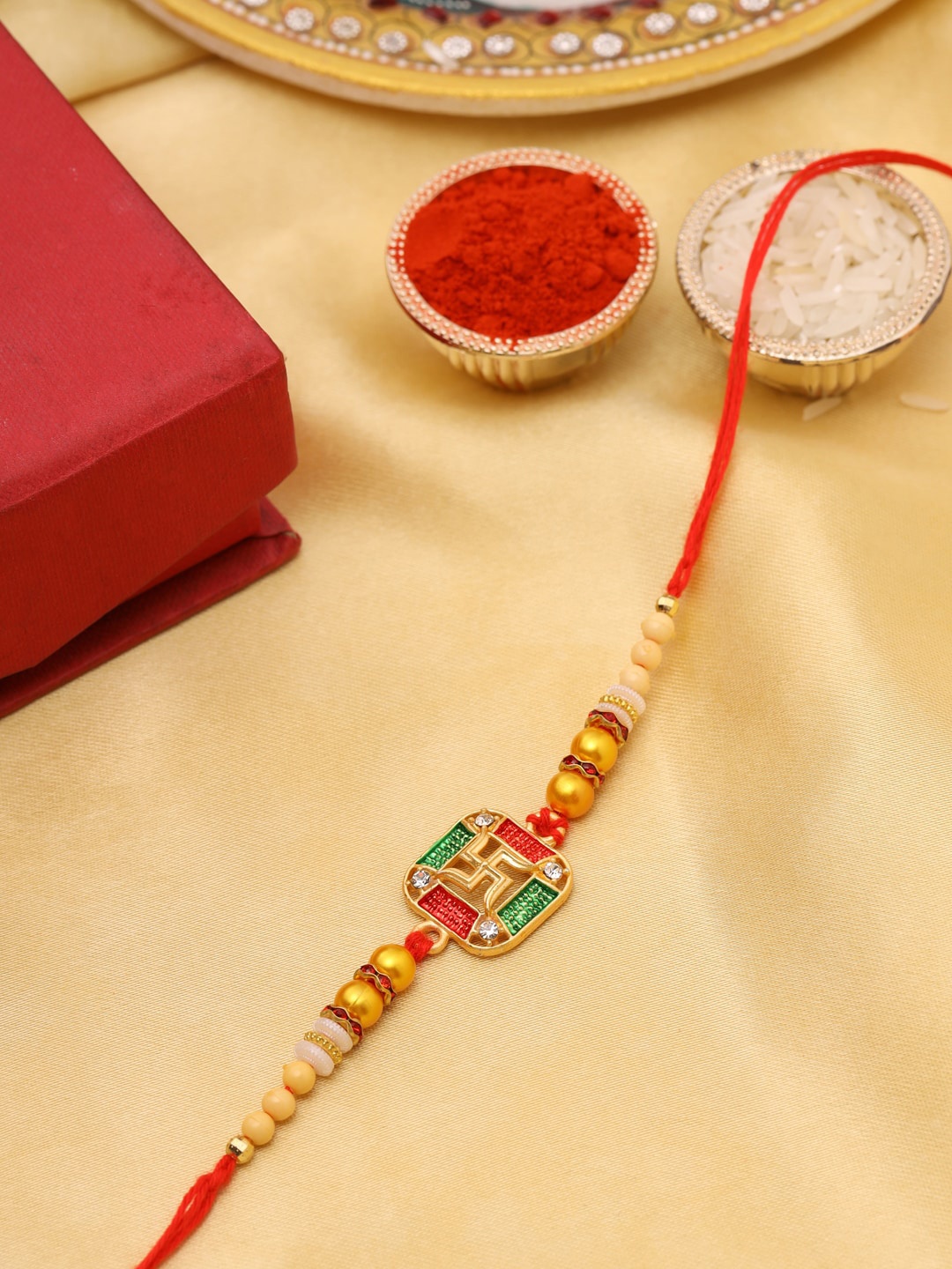 

VIRAASI Men Green & Red Swastik Rakhi With Roli Chawal, Multi