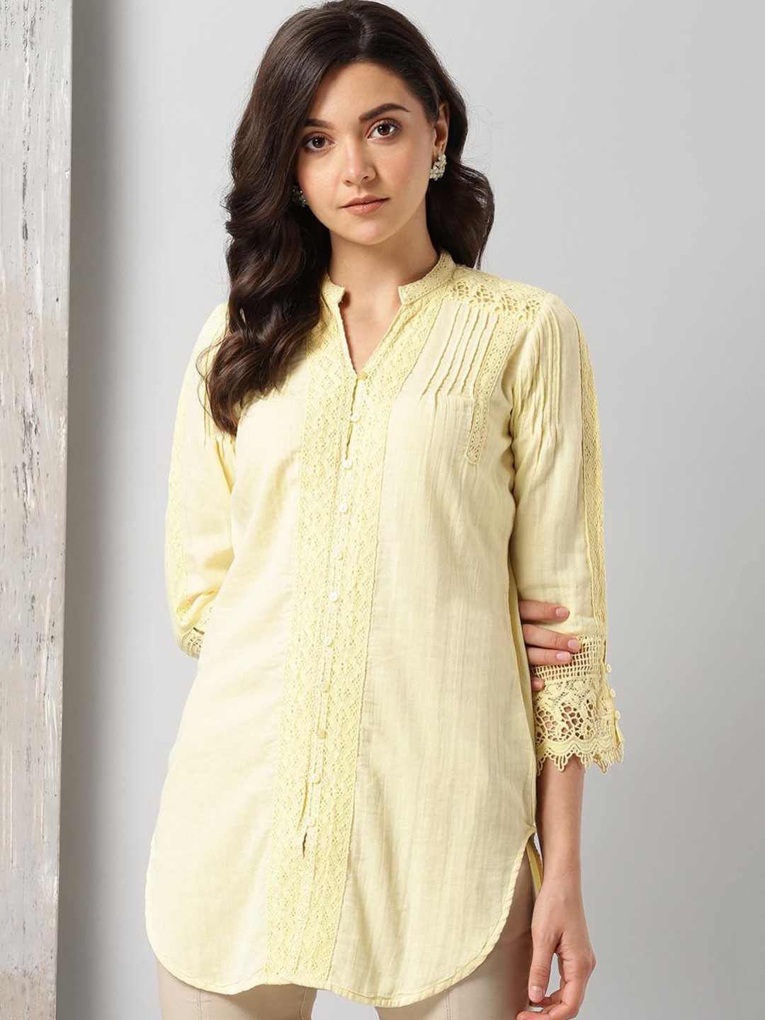 

Lakshita Yellow Solid Kurti