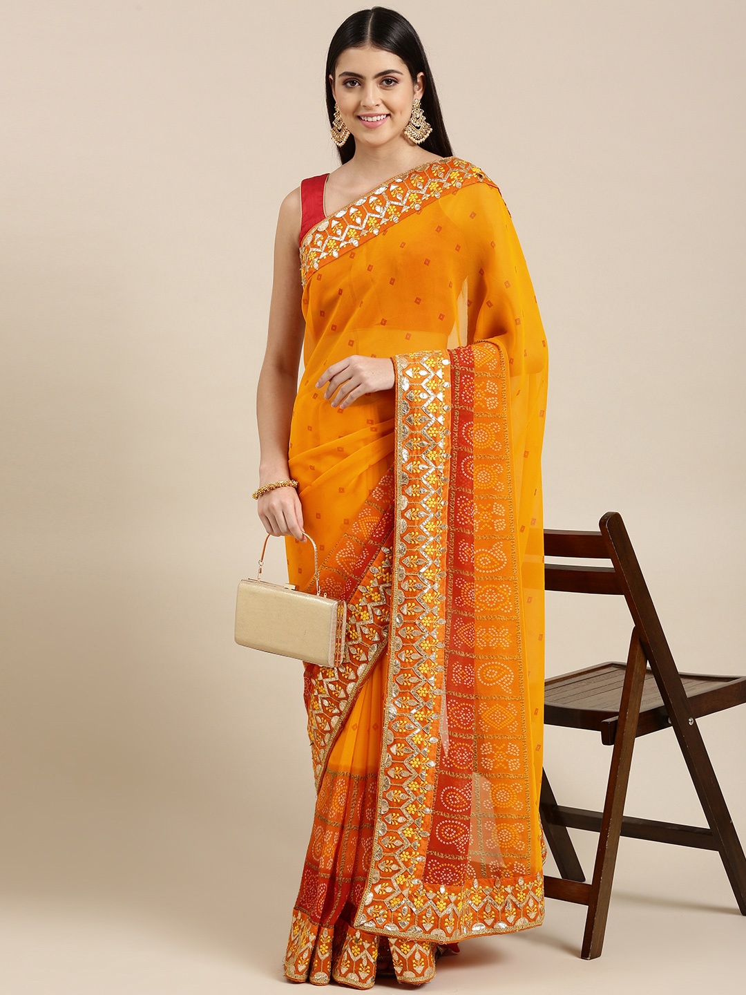 

Mitera Mustard & Red Bandhani Gotta Patti Pure Georgette Bandhani Saree