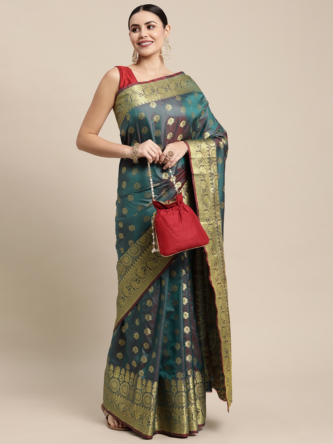 

Mitera Teal & Gold-Toned Ethnic Motifs Zari Silk Blend Banarasi Saree