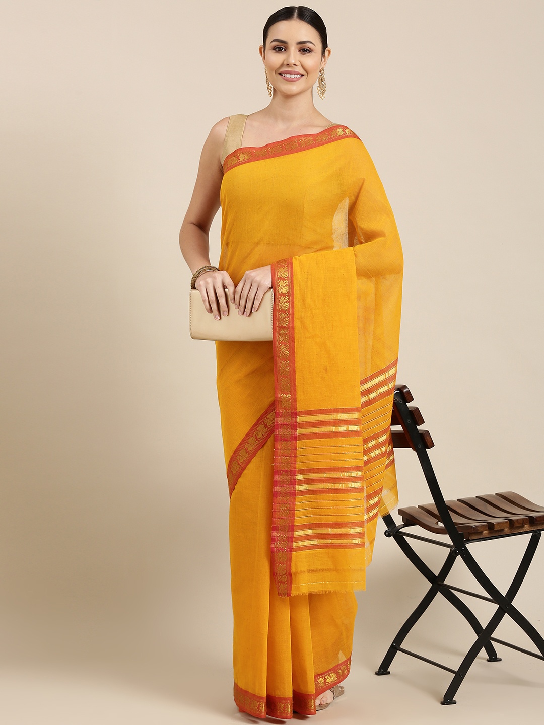 

KALINI Gold & Orange Solid Cotton Venkatgiri Saree