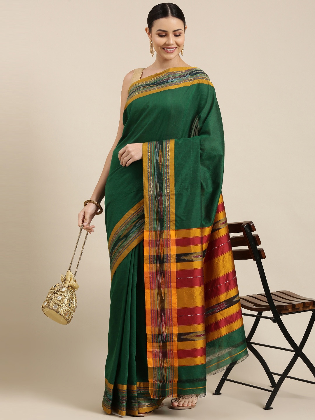 

KALINI Green & Yellow Solid Cotton Pochampally Saree